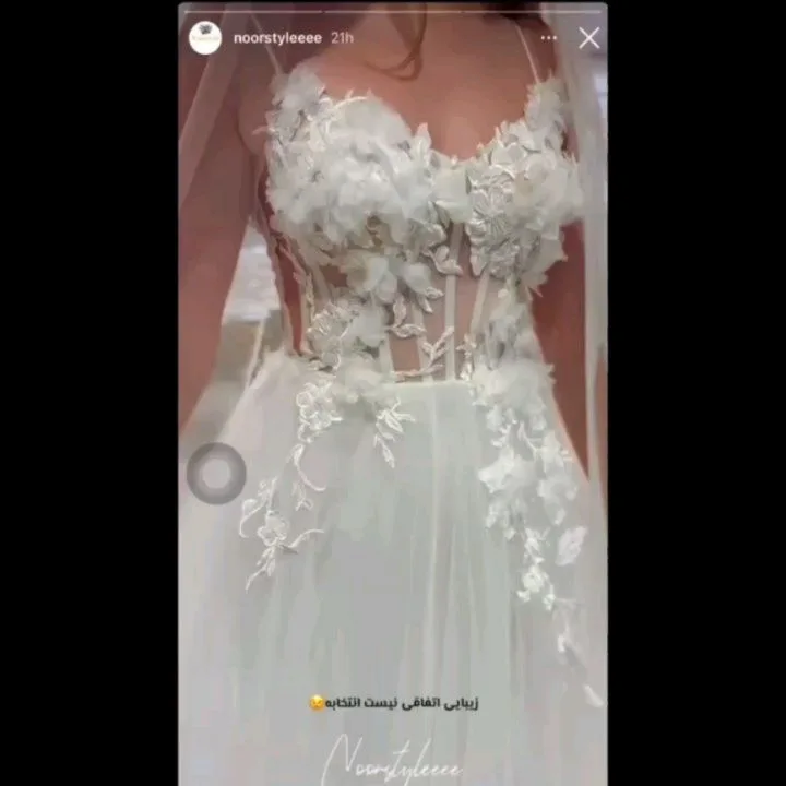لباس عروس مدل ماهی سایز ۳۶ نوراستایل، رنگ سفید و مشکی، جنس ساتن و تور، طرح گلدار، بلند، یقه دکلته، بدون آستین