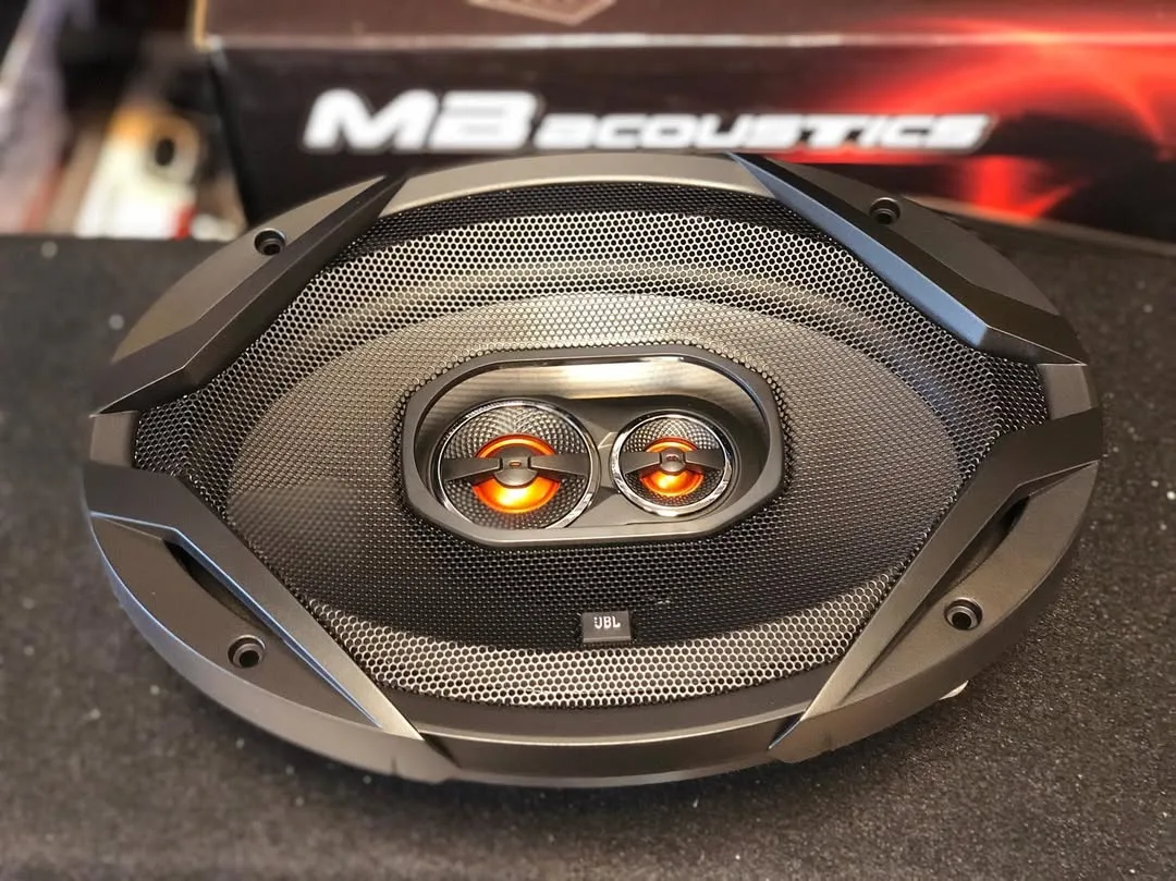 باند خودرو GX 963 JBL، رنگ مشکی و نارنجی، جنس پلاستیک و فلز، بیضی با توری