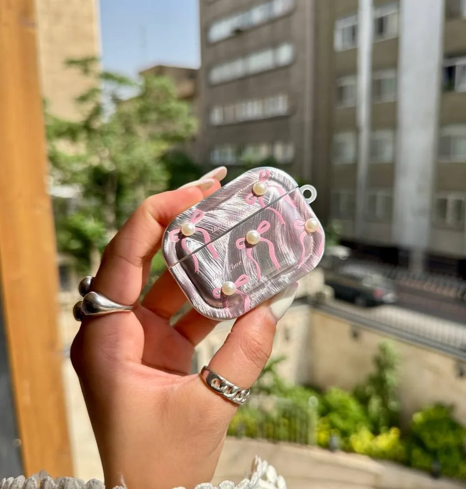 قاب پاپیونی صورتی و کاور ایرپاد — عکس ۳