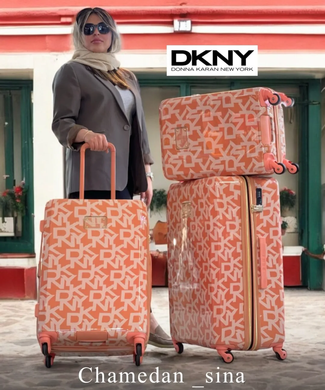 ست چمدان DKNY، رنگ نارنجی و سفید، جنس پلاستیک، چرخ‌دار، سخت، سه سایز