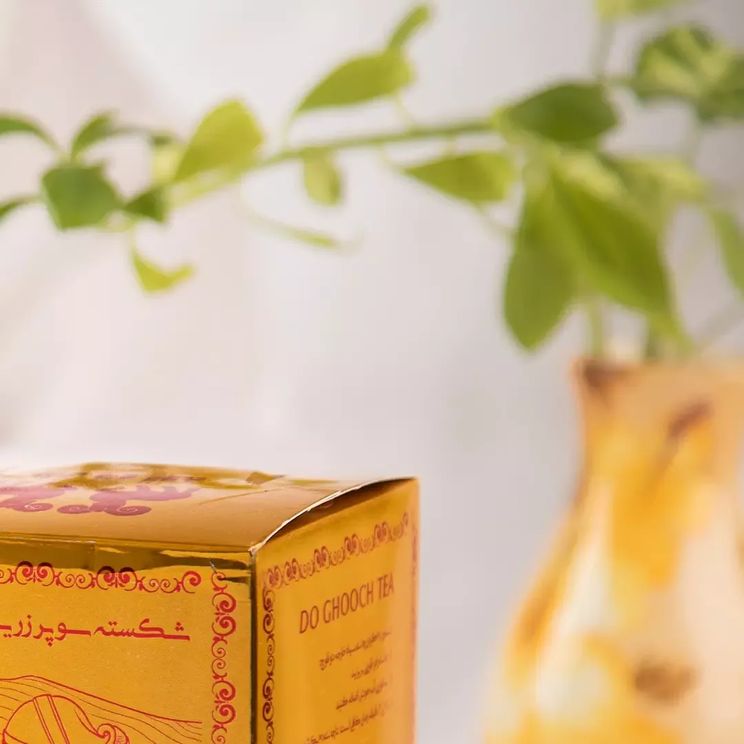 چای دو قوچ ۵۰۰ گرمی، رنگ طلایی، قرمز و سبز، جنس مقوا، جعبه مستطیلی