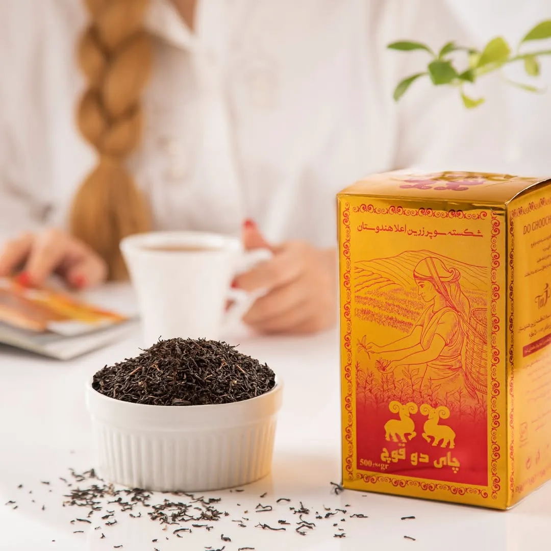 چای سیاه شکسته زرین سوپر ممتاز کلکته دو قوچ، رنگ سفید، طلایی و قرمز، جنس مقوا، جعبه مقوایی مستطیلی