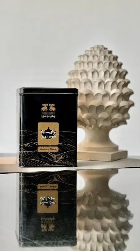 چای طلایی ۴۵۰ گرمی قوطی فلزی دو قوچ، رنگ مشکی، قوطی مستطیلی