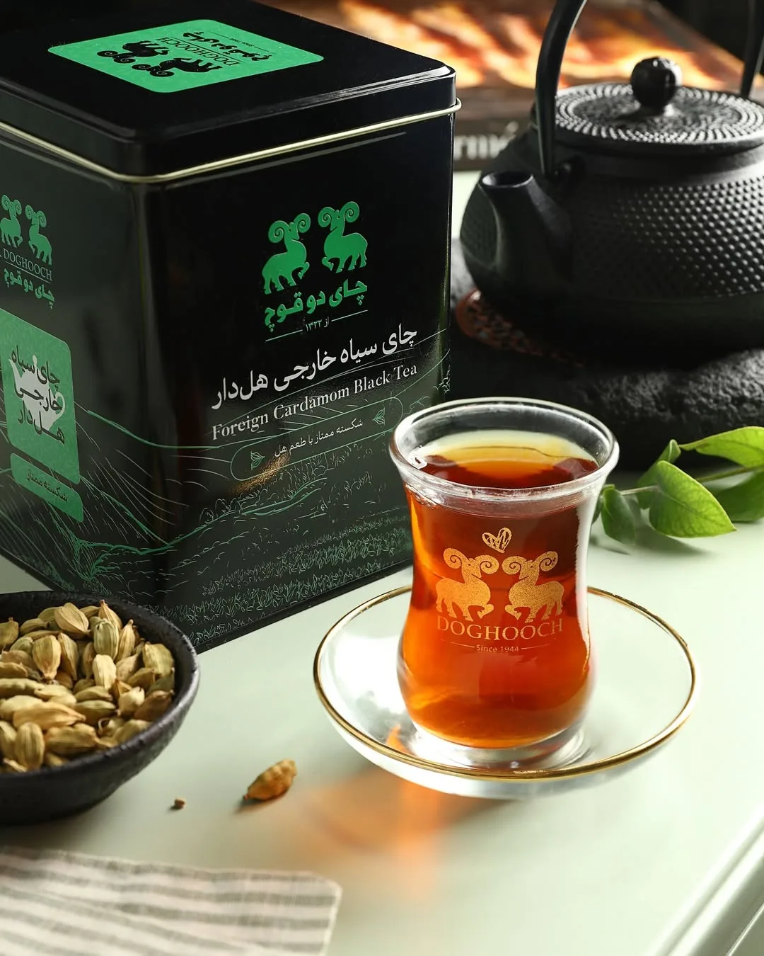 چای سیاه با تکه‌های هل دوقوچ