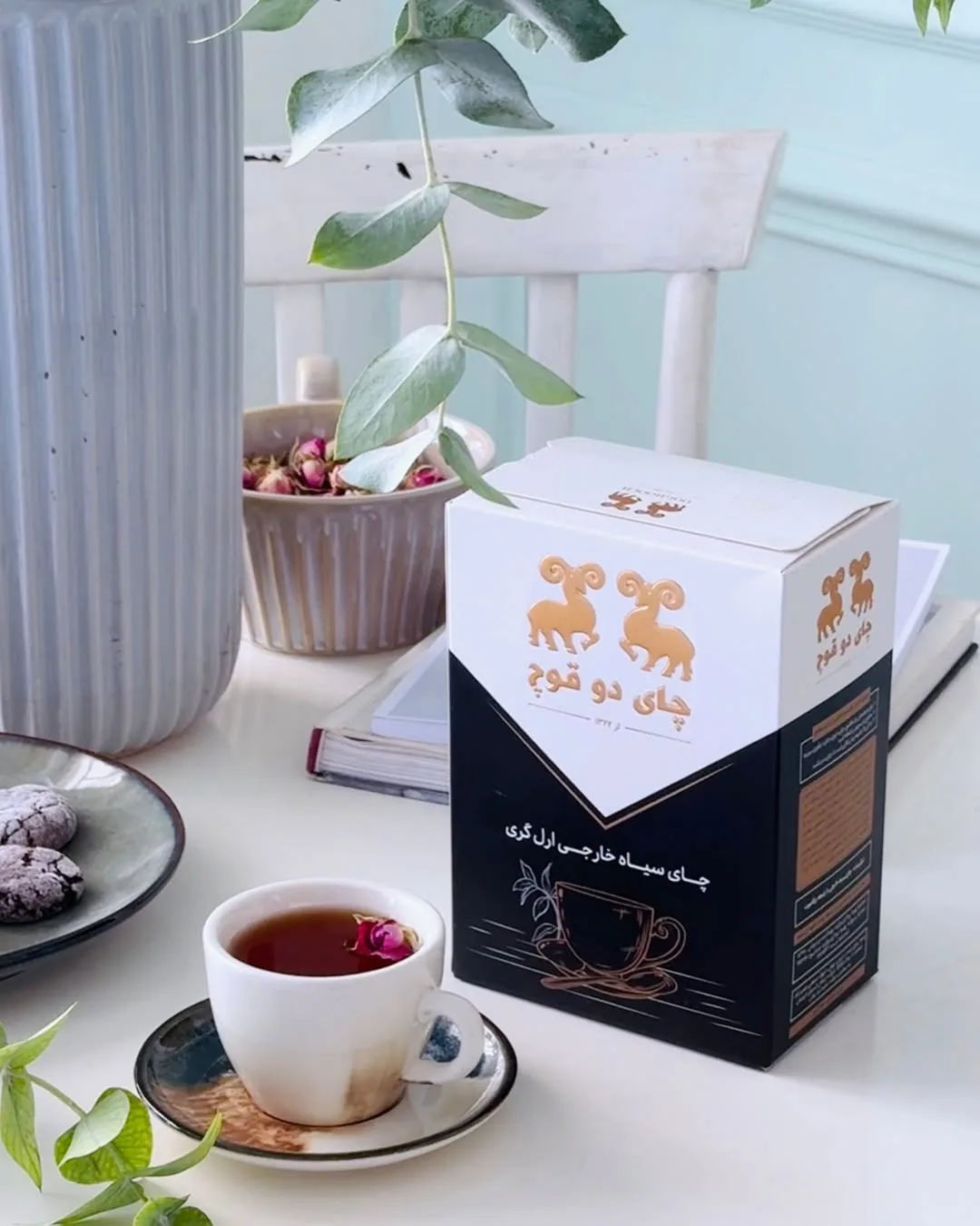 چای ارل گری ۴۵۰ گرمی دوقوچ، رنگ سفید و مشکی، جنس مقوا، جعبه مکعبی