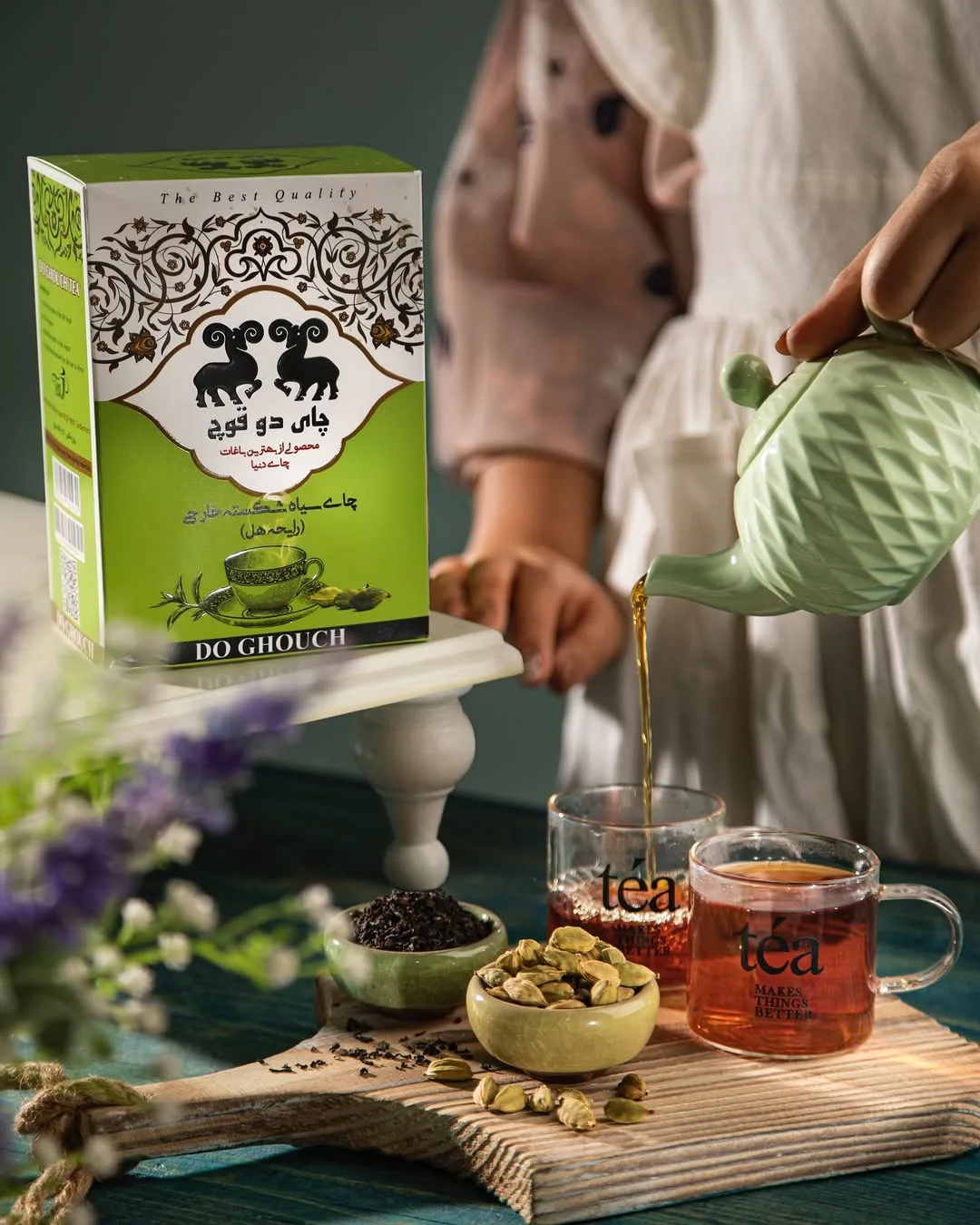 چای سیاه هل دوقوچ، رنگ سبز و سفید، جنس مقوا، جعبه مستطیلی
