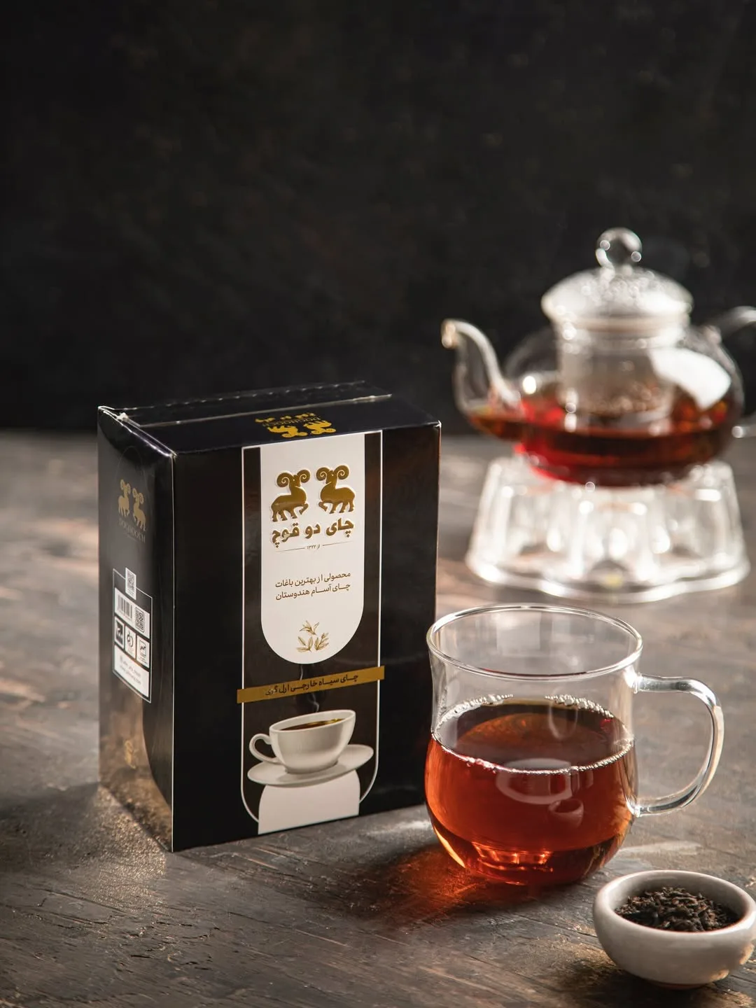 چای سیاه ارل گری با عطر برگاموت دوقوچ، رنگ مشکی و سفید، جنس مقوا، جعبه مستطیلی