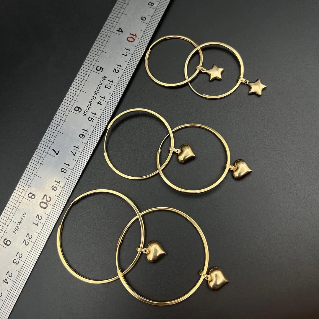 گوشواره حلقه‌ای و آویز ایتالیایی، رنگ طلایی، جنس طلا، حلقه‌ای با آویز ستاره و قلب