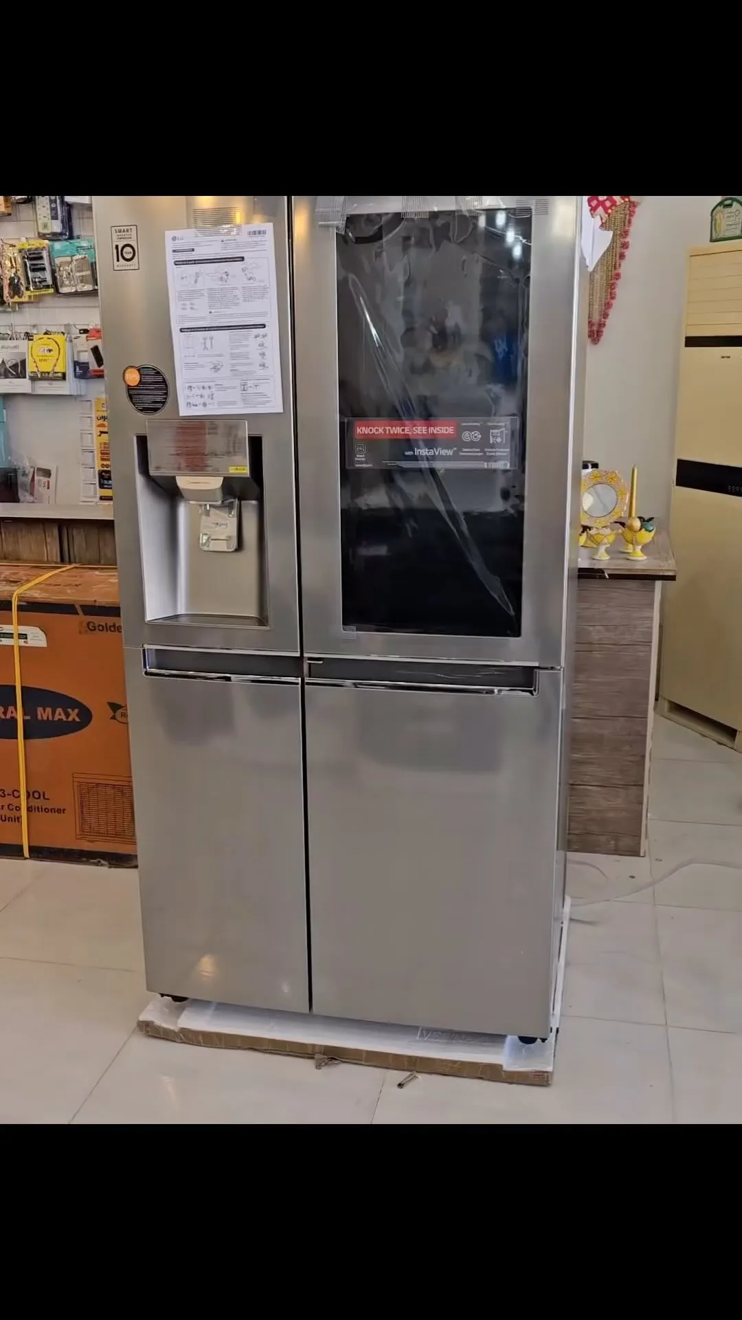 یخچال ساید بای ساید اینستاویو مدل X260 ال‌جی، رنگ نقره‌ای و مشکی، جنس استیل و شیشه، دو درب اینستاویو