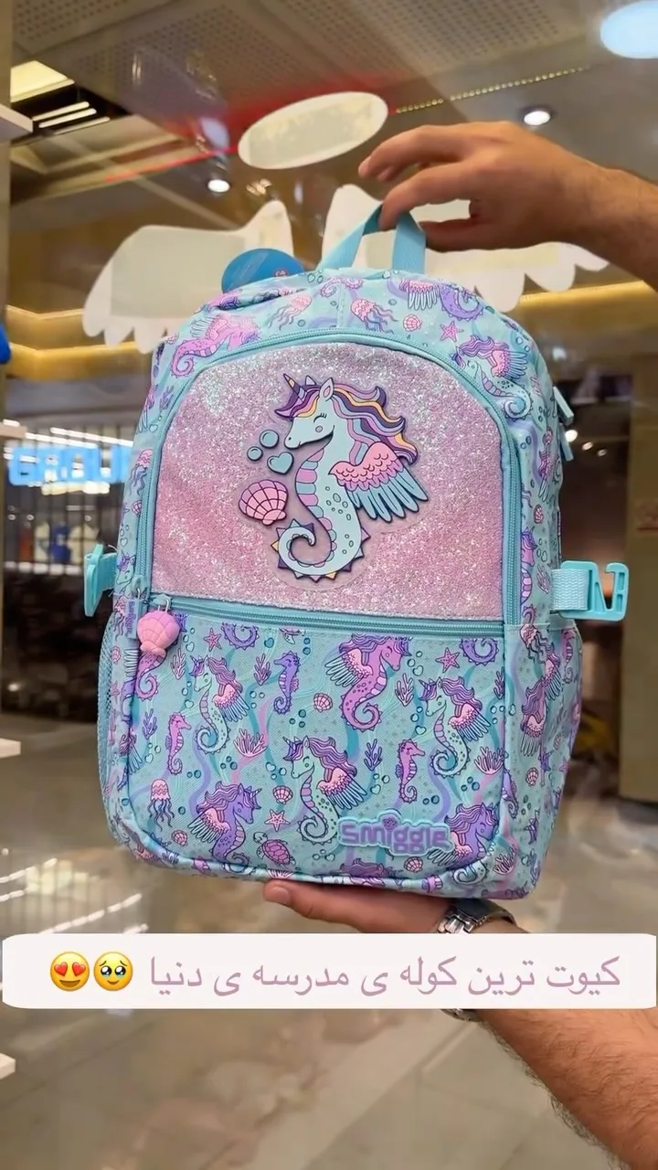 کوله پشتی اسمیگل Smiggle، رنگ آبی، صورتی و بنفش، جنس چرم مصنوعی، طرح طرح کارتونی، کوله پشتی مدرسه