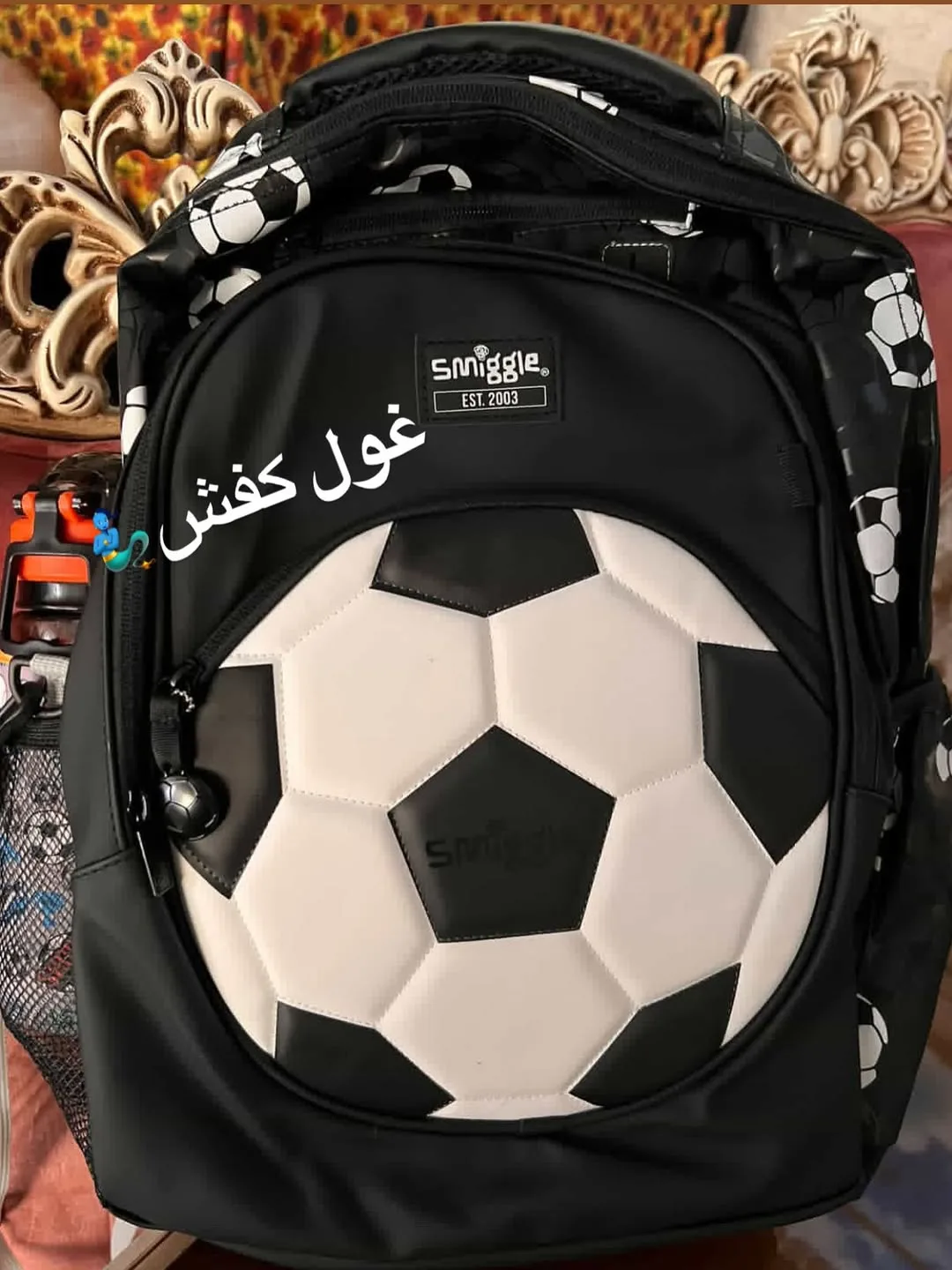 کوله پشتی اسمیگل، رنگ مشکی و سفید، طرح شخصیت کارتونی