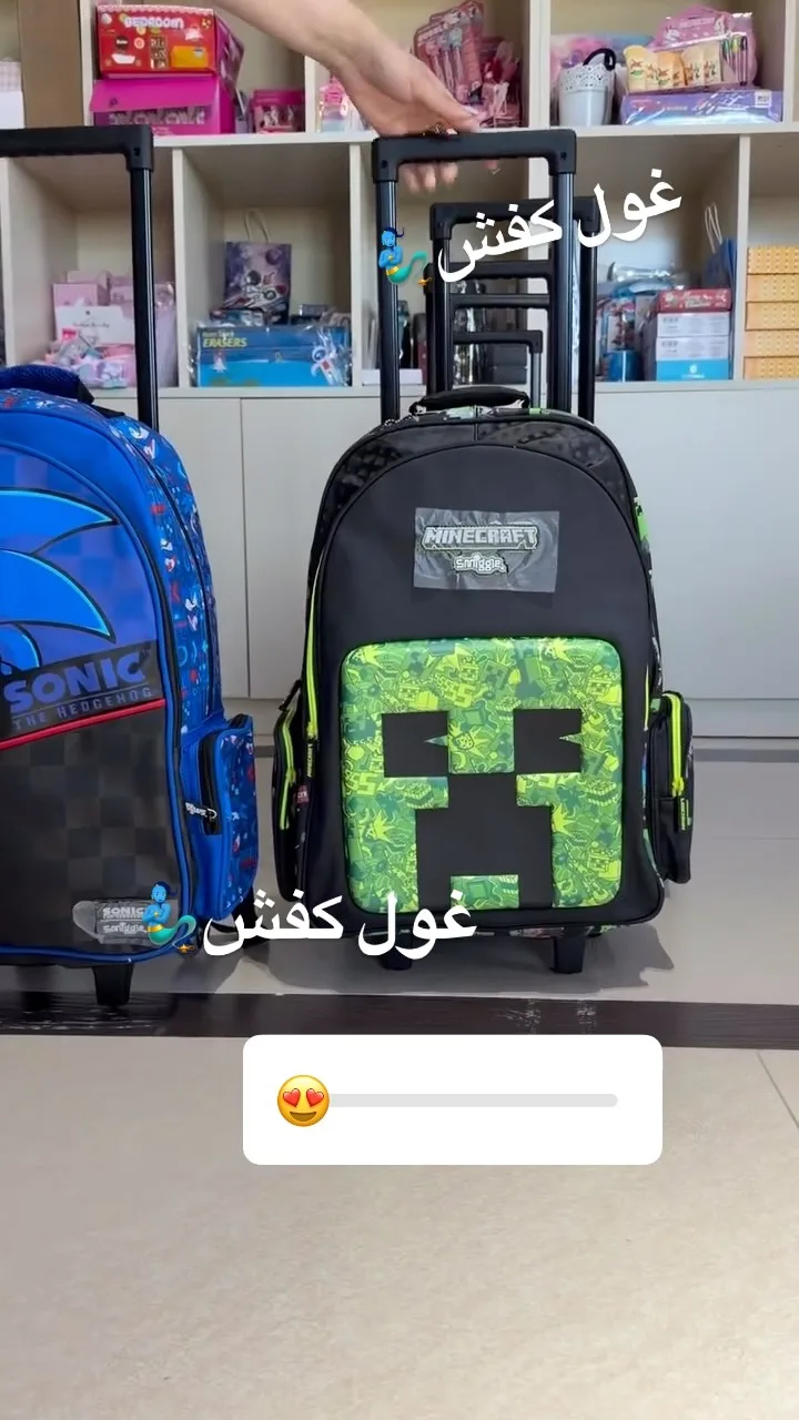 کوله پشتی چرخ دار بچگانه، رنگ آبی، مشکی و سبز، جنس برزنت، طرح شخصیت کارتونی، دستهدار و چرخدار