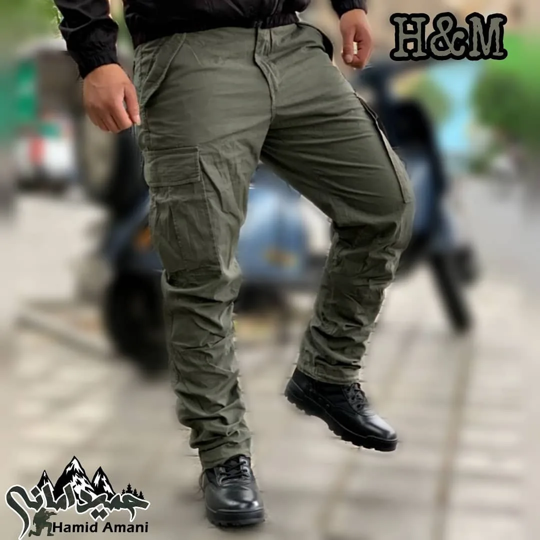 شلوار شش جیب دمپاکش کتان، رنگ سبز زیتونی، جذب، جیب دار