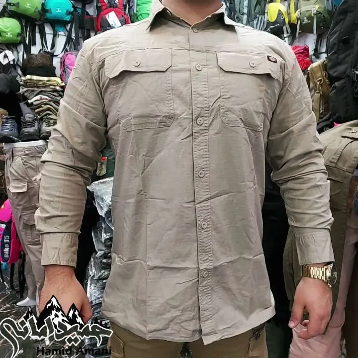 پیراهن دو جیب کتان دیکیز Dickies، رنگ کرم، آستین‌بلند یقه‌برگرد دکمه‌دار