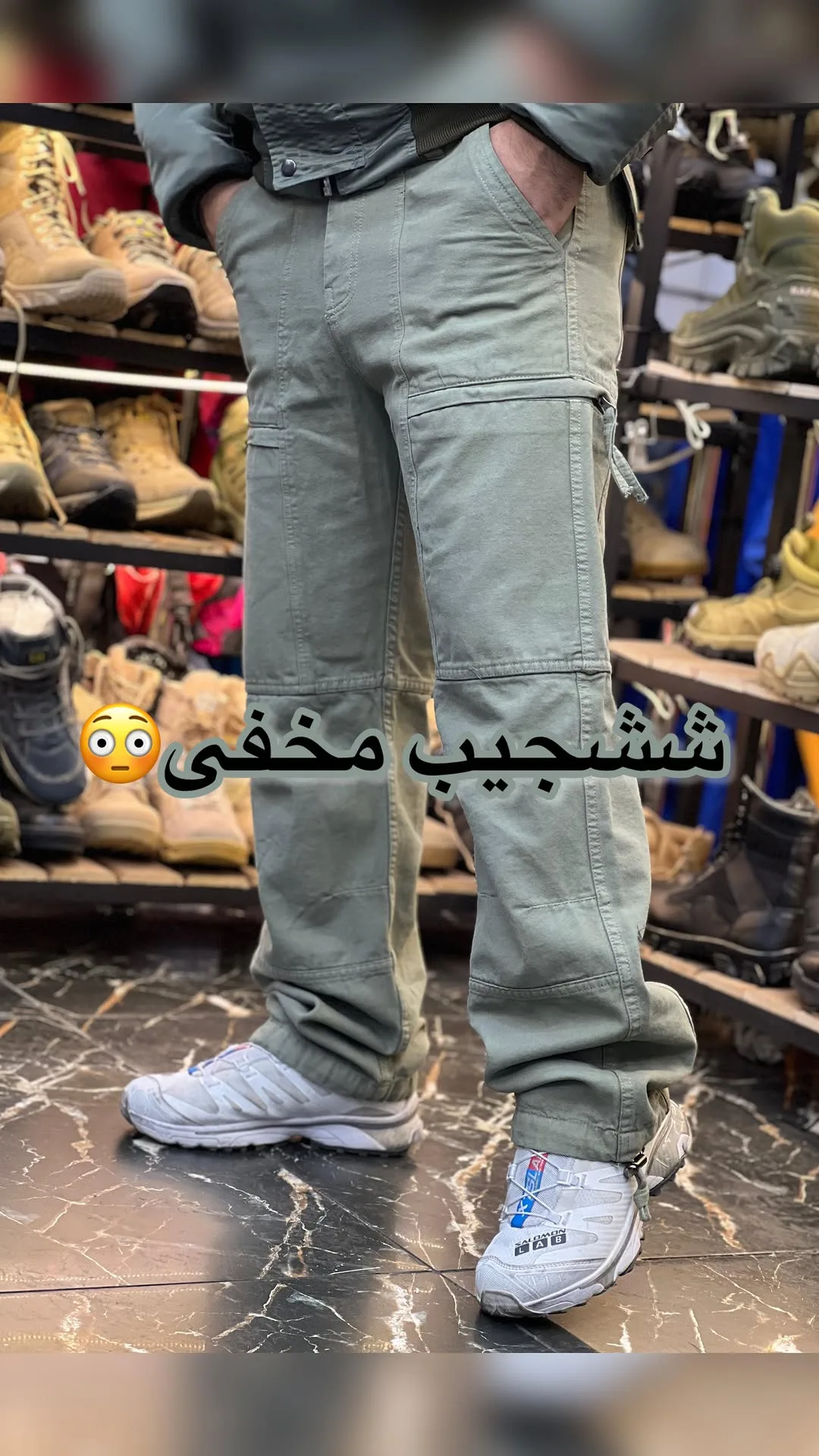 شلوار شش‌جیب جیب‌مخفی، رنگ سبز زیتونی، کمرکش، جیب‌های کناری