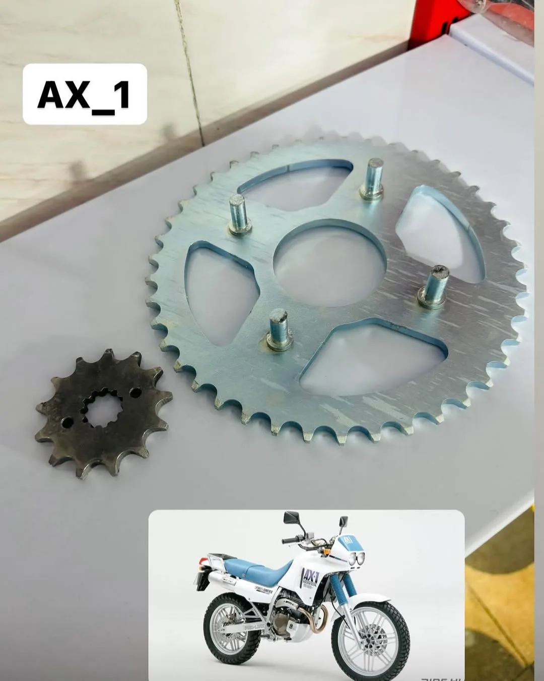 زنجیر و دنده هوندا AX-1 250، رنگ نقرهای و مشکی، جنس فلز، دندانه دار