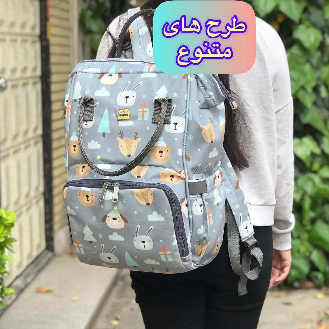 کوله پشتی لوازم نوزاد، رنگ خاکستری و چندرنگ، جنس برزنتی، کولهپشتی دوشی زیپدار