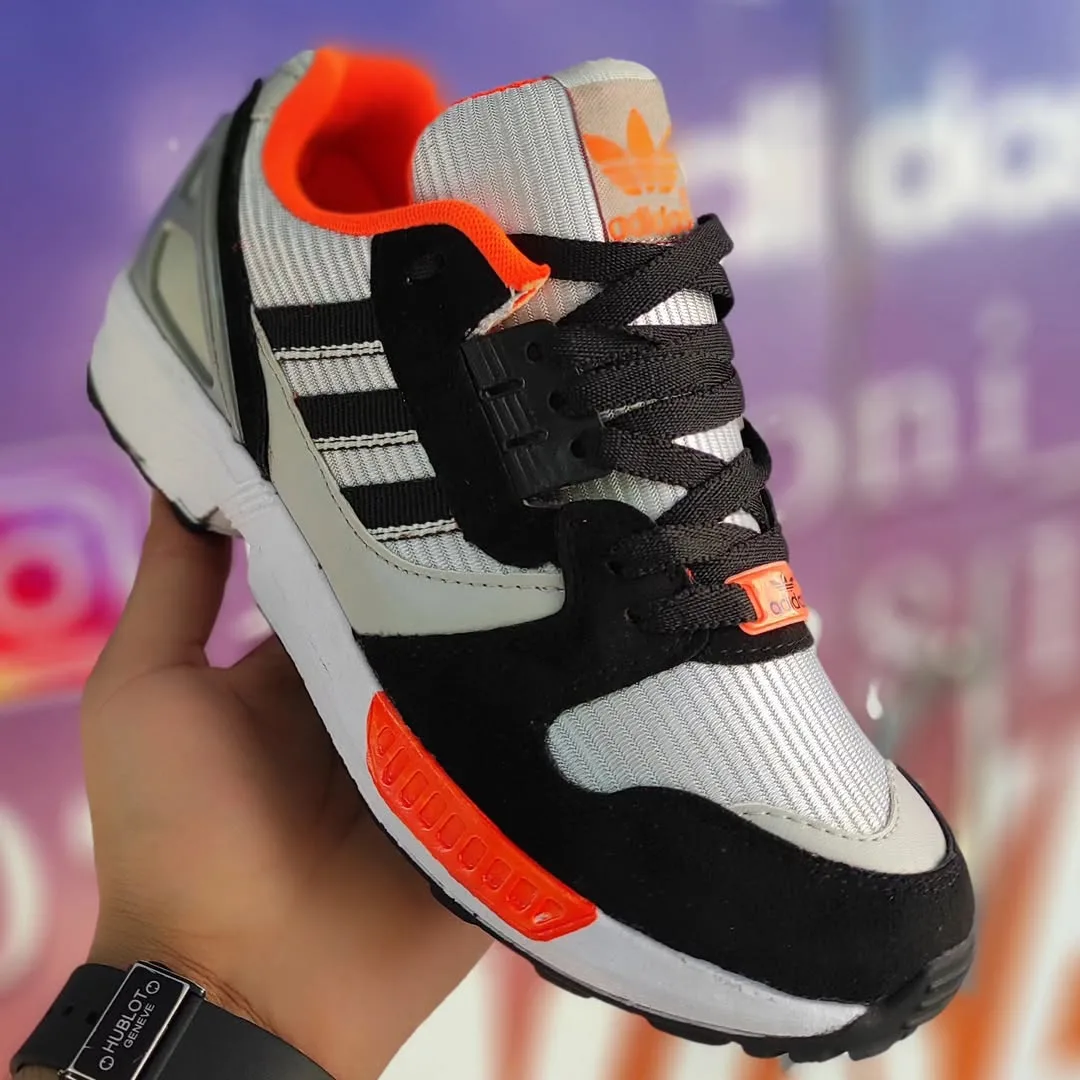 کتانی آدیداس ZX8000، رنگ خاکستری، مشکی و نارنجی، بنددار