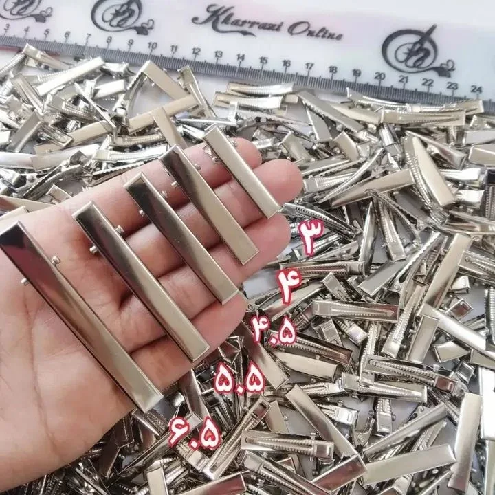 گیره انبری گلسر، رنگ نقره‌ای، جنس فلز، مستطیلی، تخت