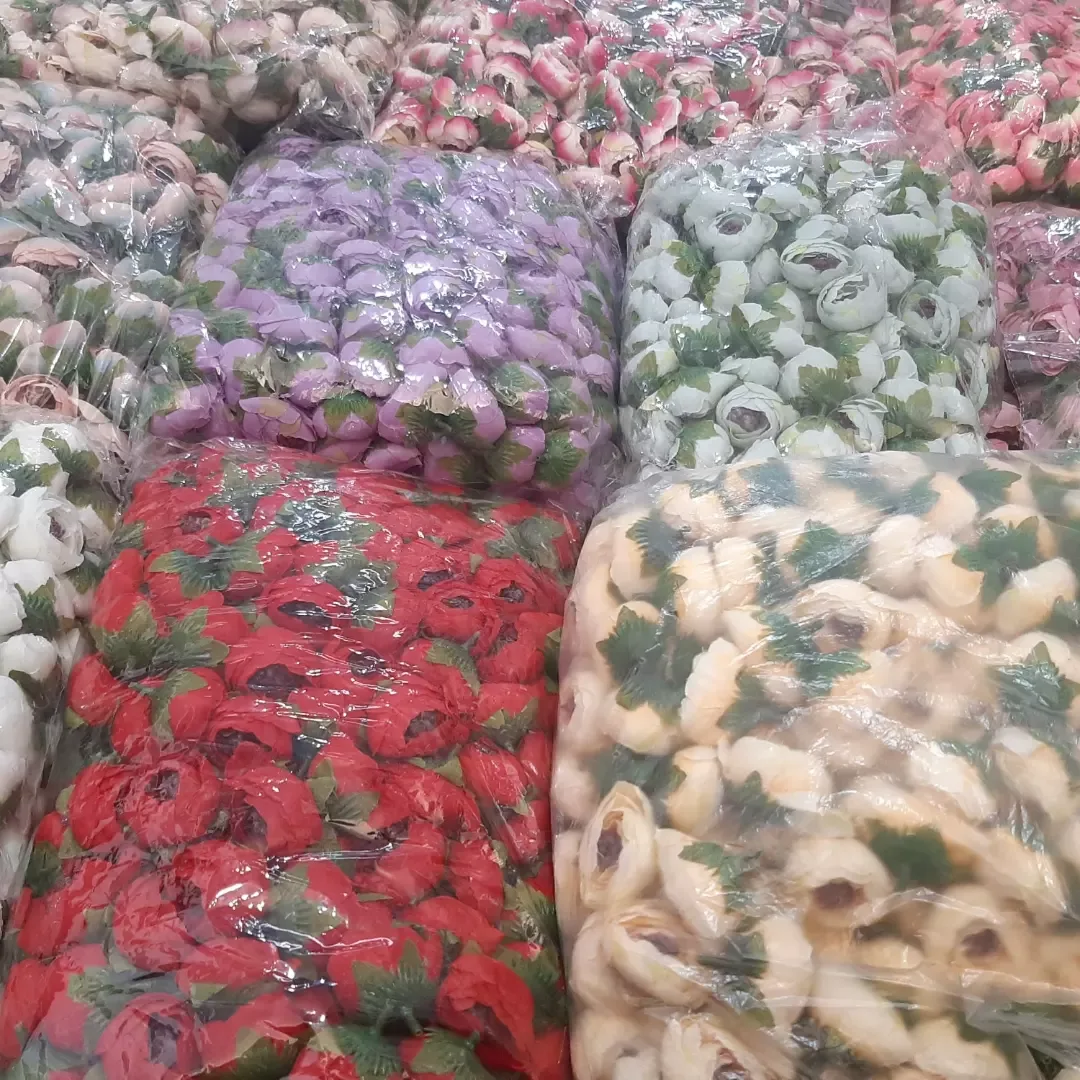 سرگل نسترن — نمای بسته‌بندی — بسته‌های رنگارنگ — عکس ۳