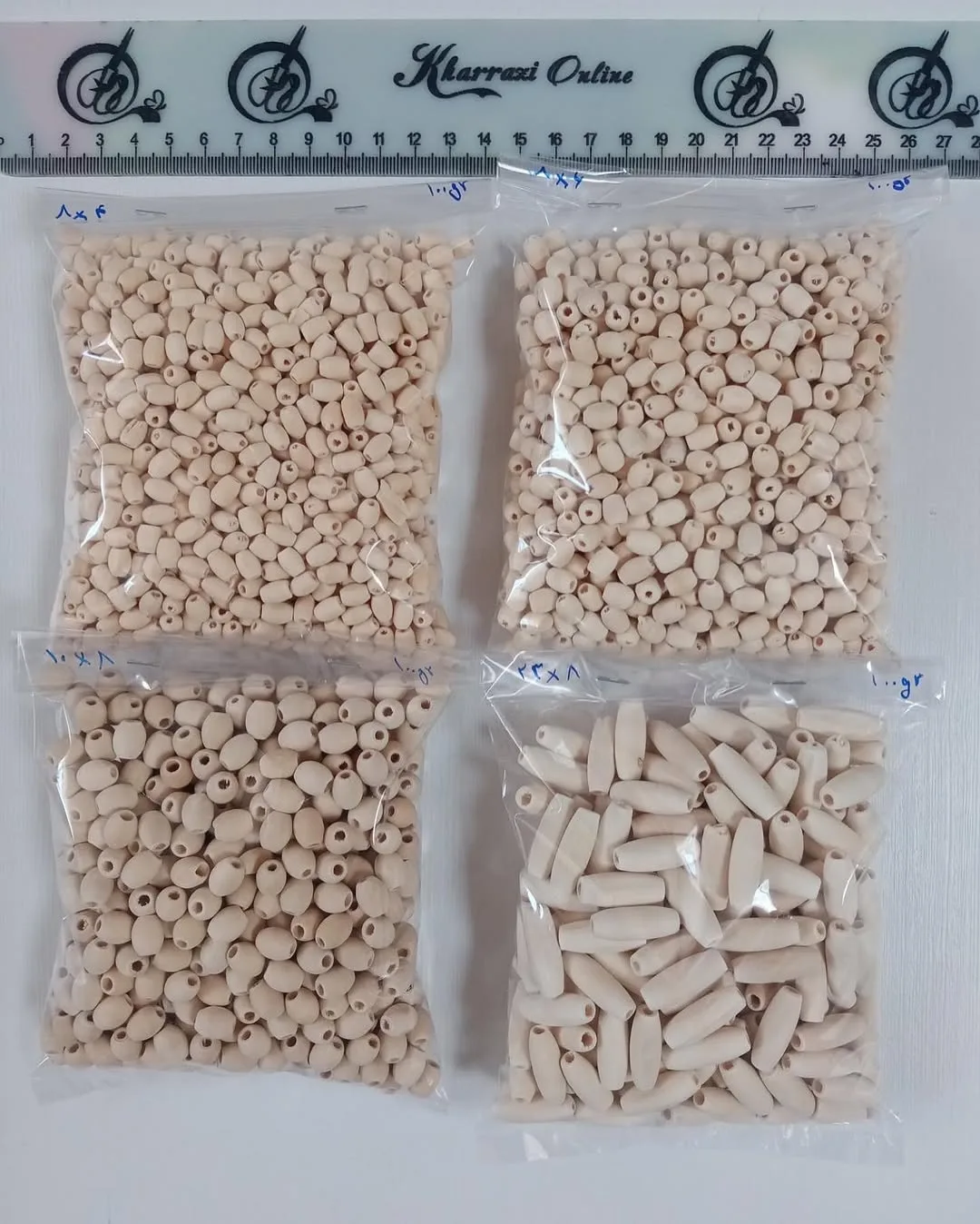 مهره چوبی — رنگ کرم — نمای بسته‌بندی — اشکال بیضی و استوانه — عکس ۷