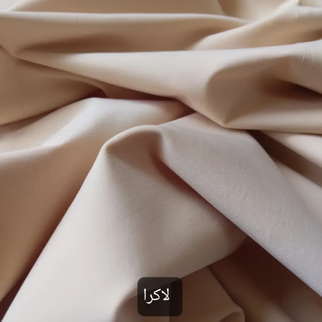 پارچه — رنگ کرم — نمای در‌دست — لاکرا،کرپ اسکاچی،گاردن،غواصی،کرپ پارسی — عکس ۲