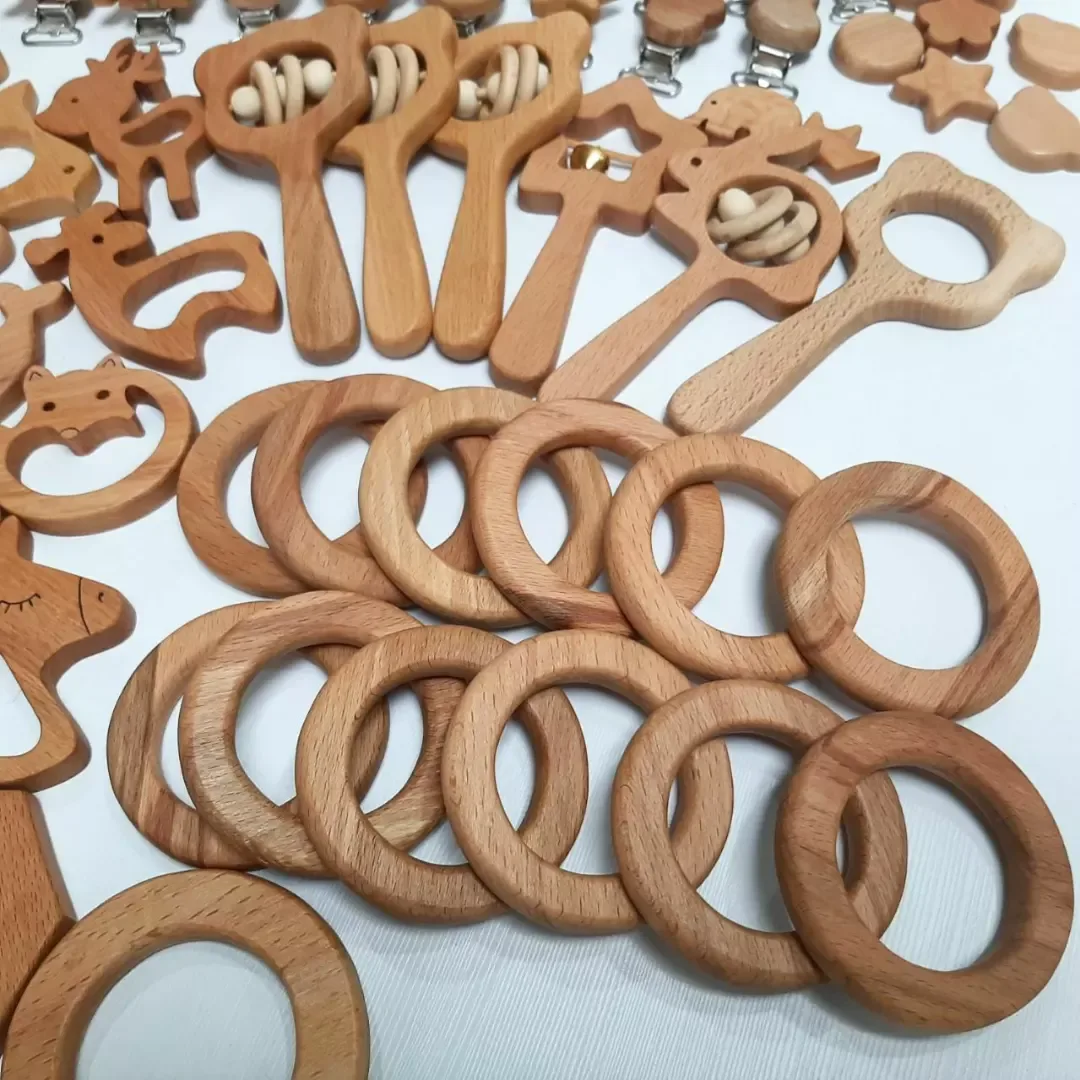 دندونی چوب راش روغن زده — رنگ قهوه‌ای — نمای چندکالا — گیره بند پستانک — عکس ۵