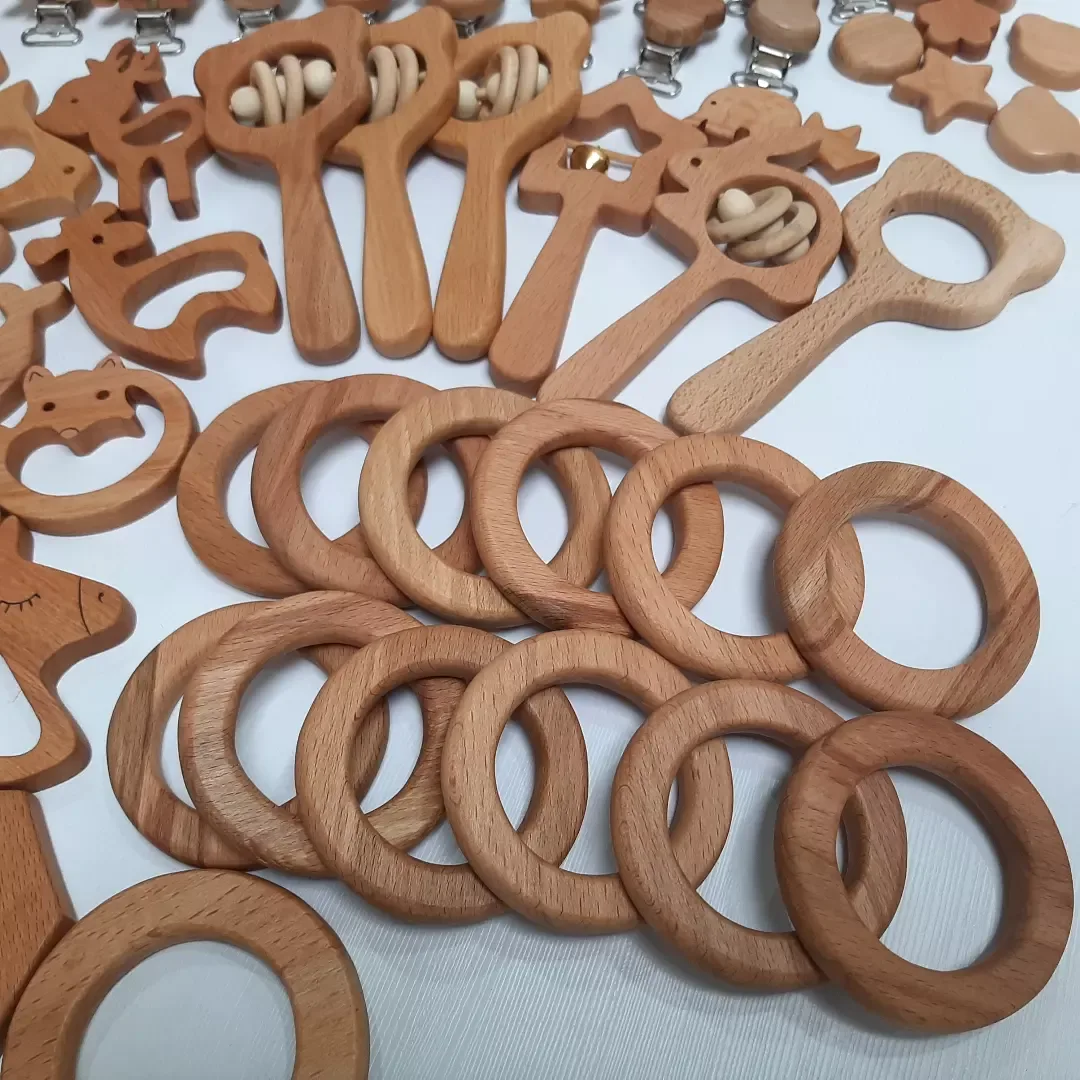دندونی چوب راش روغن زده — رنگ قهوه‌ای — نمای چندکالا — گیره بند پستانک — عکس ۹