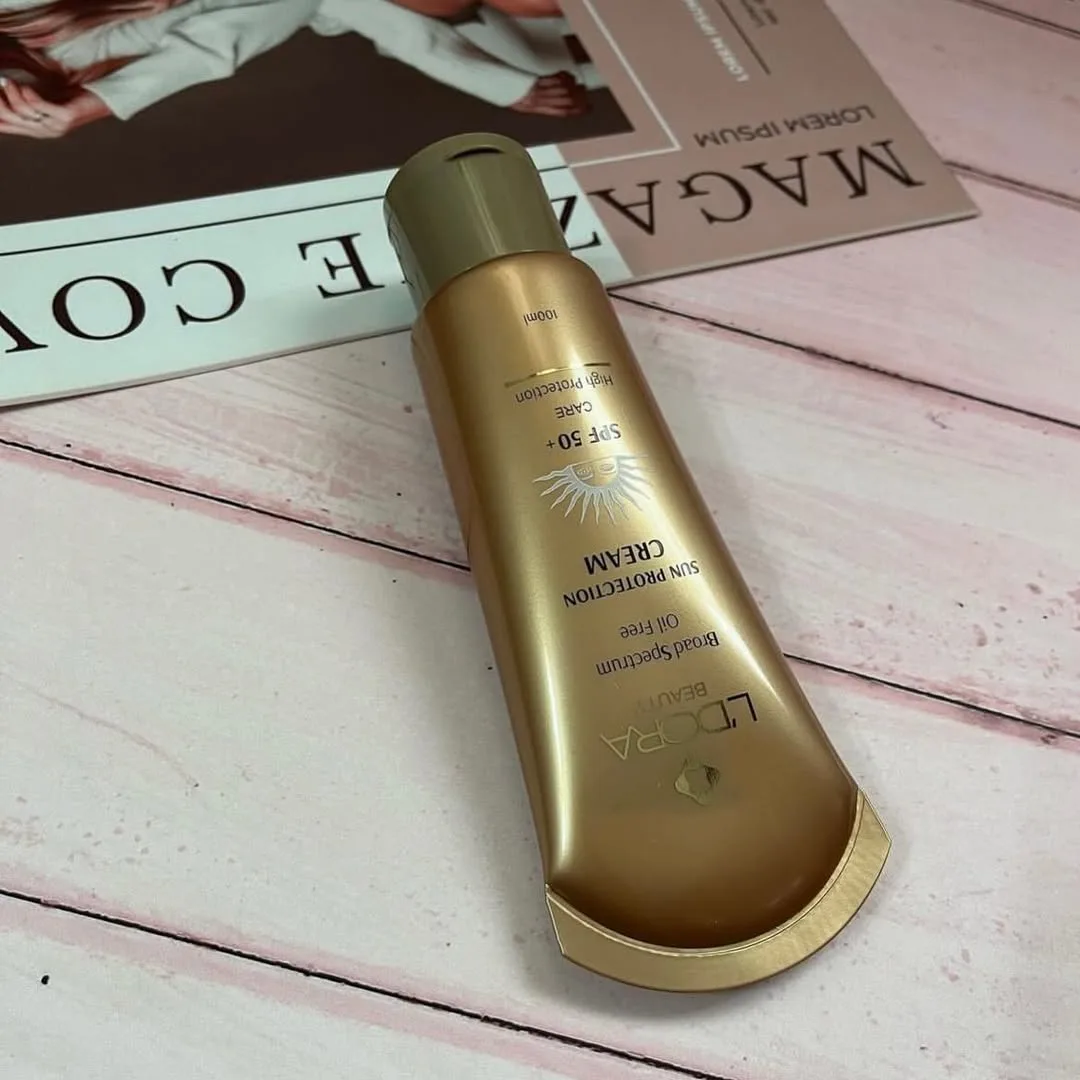 کرم ضد آفتاب SPF 50 لدورا، رنگ طلایی، جنس پلاستیک، تیوپی