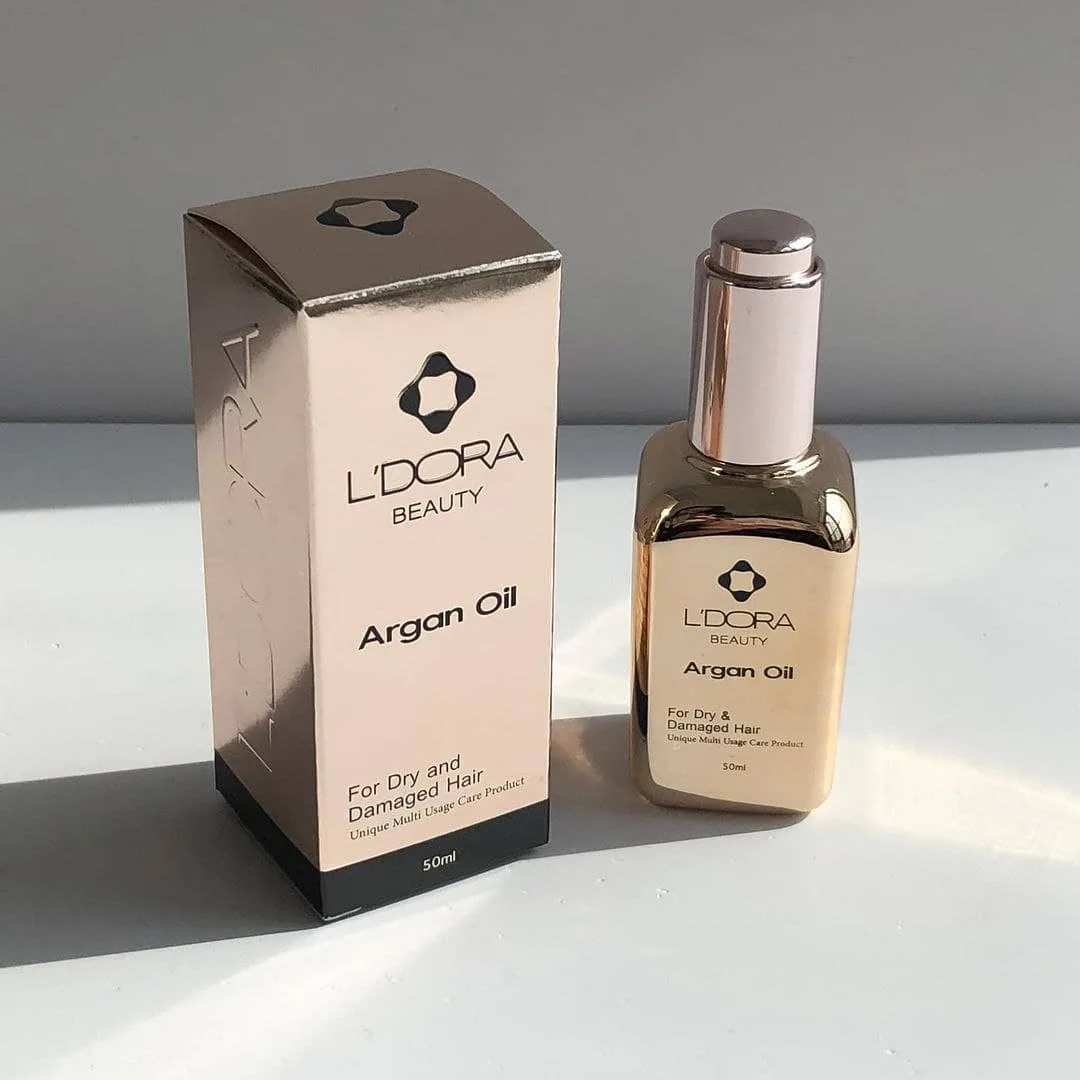 روغن آرگان مو لدورا، رنگ طلایی و سفید، جنس شیشه و پلاستیک، بطری قطرهچکانی