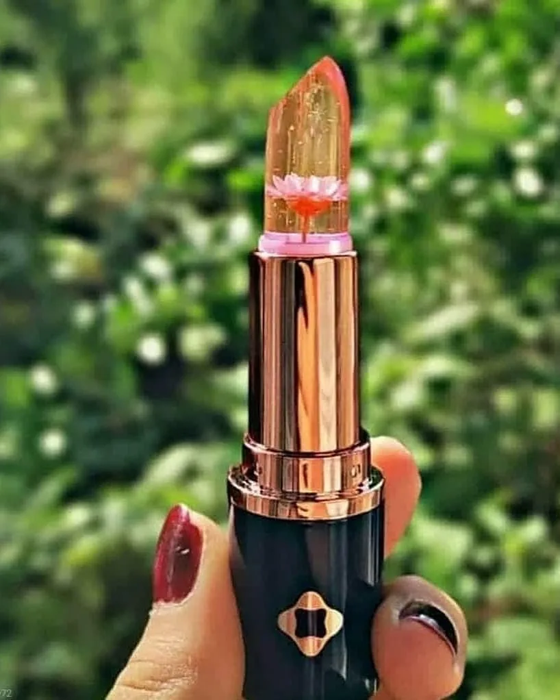 رژ لب حرارتی لدورا، رنگ نارنجی، مشکی و طلایی، جنس پلاستیک، طرح گلدار، استوانهای پیچی
