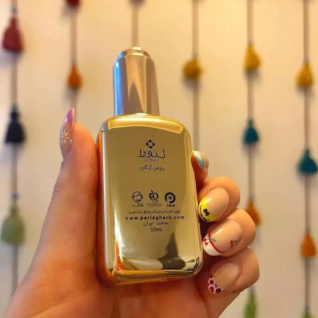 روغن آرگان خالص لدورا، رنگ طلایی، جنس شیشه و فلز، بطری پمپی