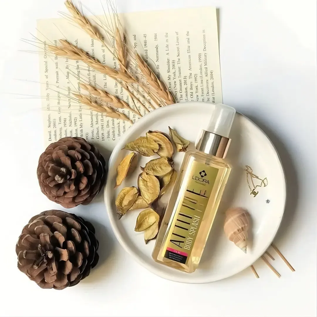بادی اسپلش لدورا، رنگ طلایی و شفاف، جنس شیشه و پلاستیک، استوانه‌ای پمپی