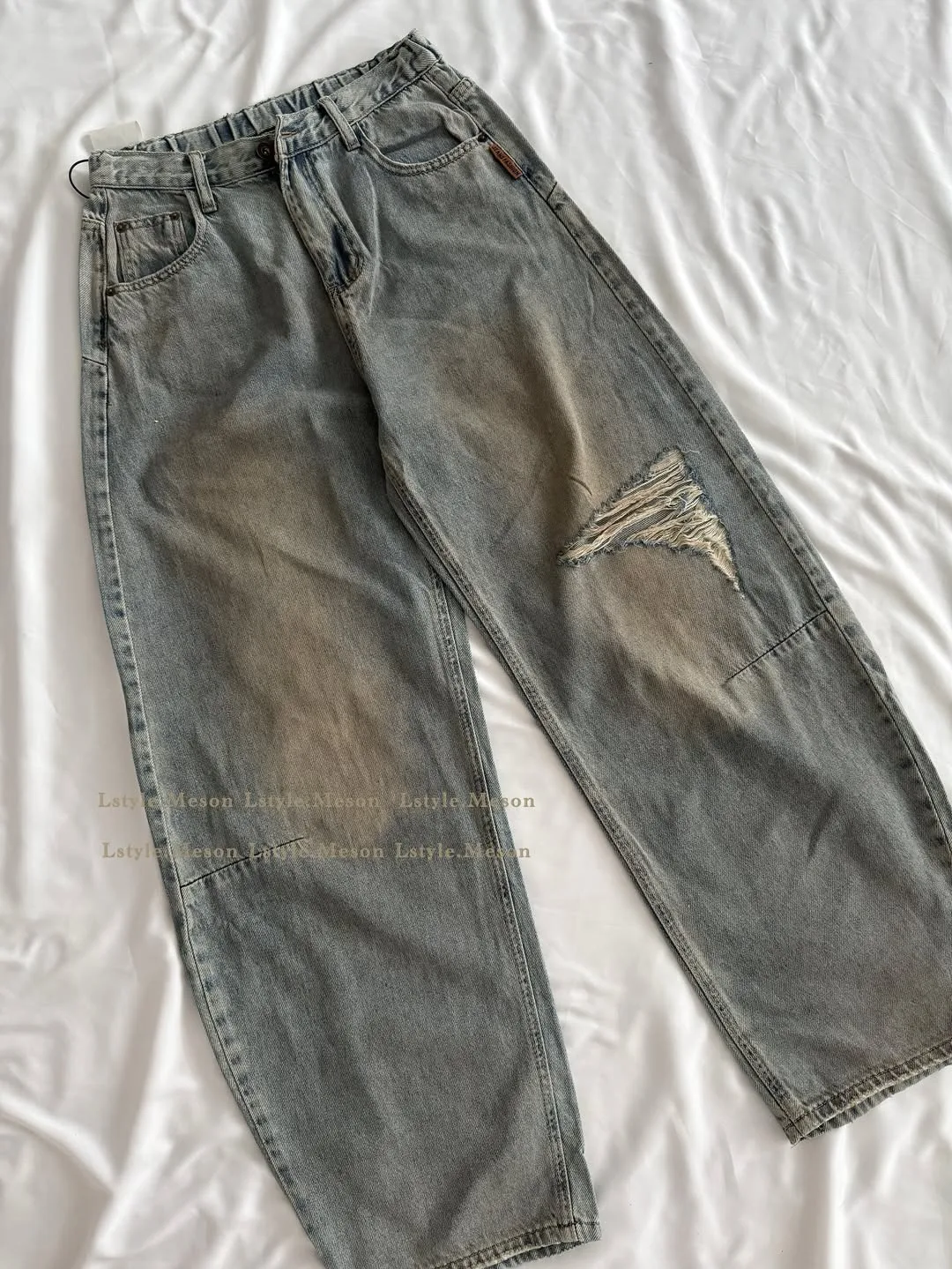شلوار زیپ‌دار، رنگ خاکستری، جنس جین، گشاد، پاره