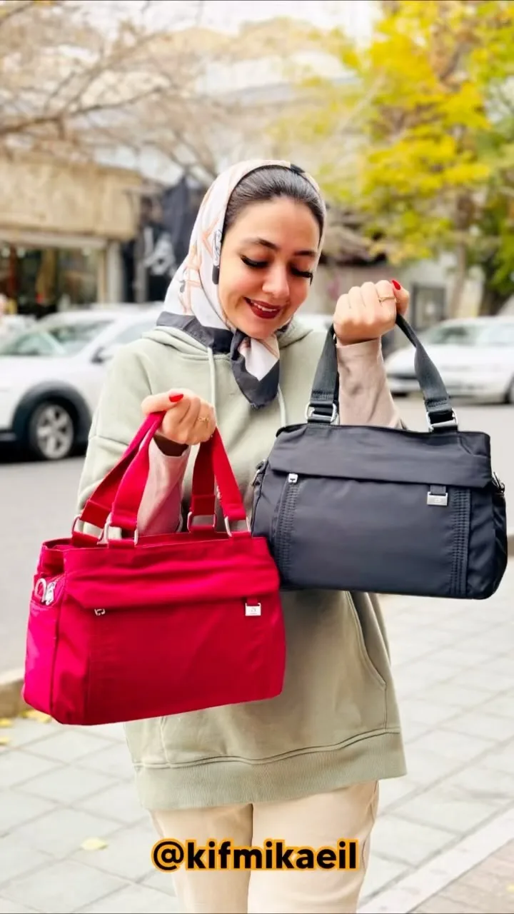 کیف دستی برزنتی ضدآب، رنگ قرمز و مشکی، جنس پارچه، مستطیلی