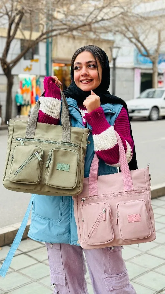 کیف دستی حاصل، رنگ زیتونی و صورتی، دوشی، جیب‌دار