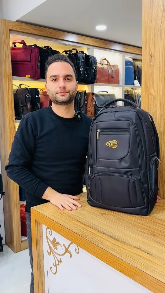 کوله‌پشتی برزنتی ضدآب کمل، رنگ مشکی، شهری، بزرگ