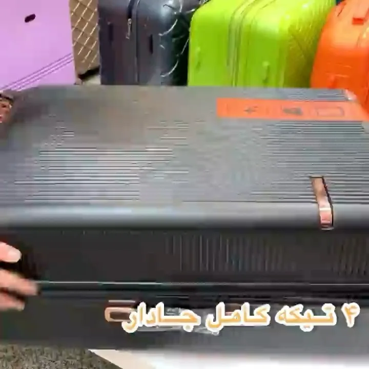 ست چهارتکه چمدان، رنگ مشکی، جنس پلاستیک، چرخ‌دار، دسته‌دار