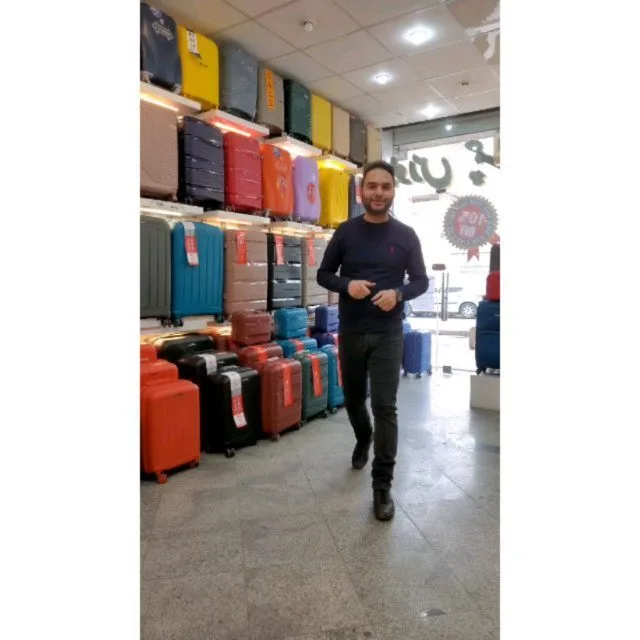 چمدان قفل TSA، رنگ قرمز، آبی، مشکی و زرد، جنس پلاستیک، چرخ‌دار، سخت