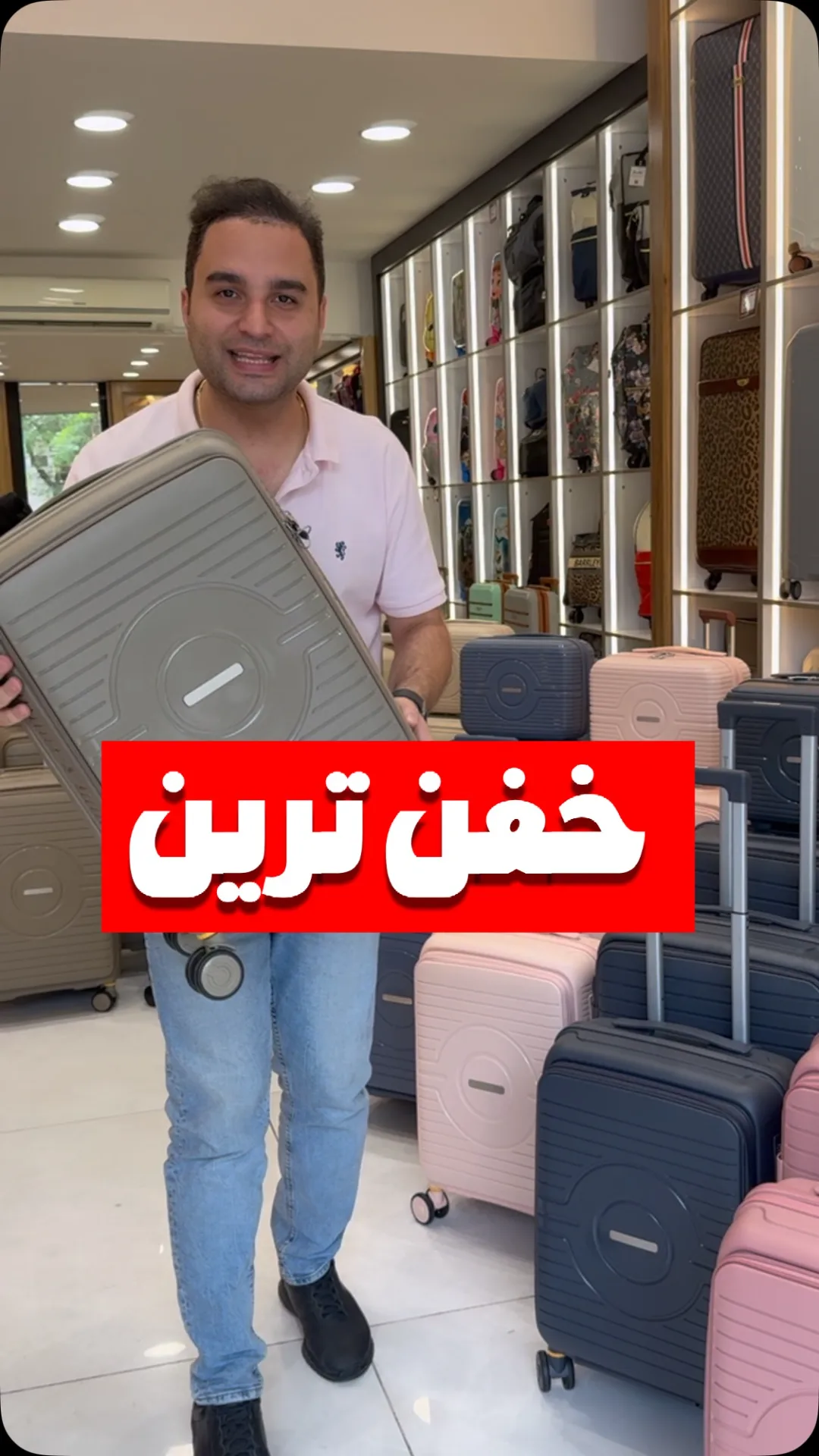 چمدان بازشو از بالا، رنگ خاکستری، جنس پلاستیک، سخت، چرخدار