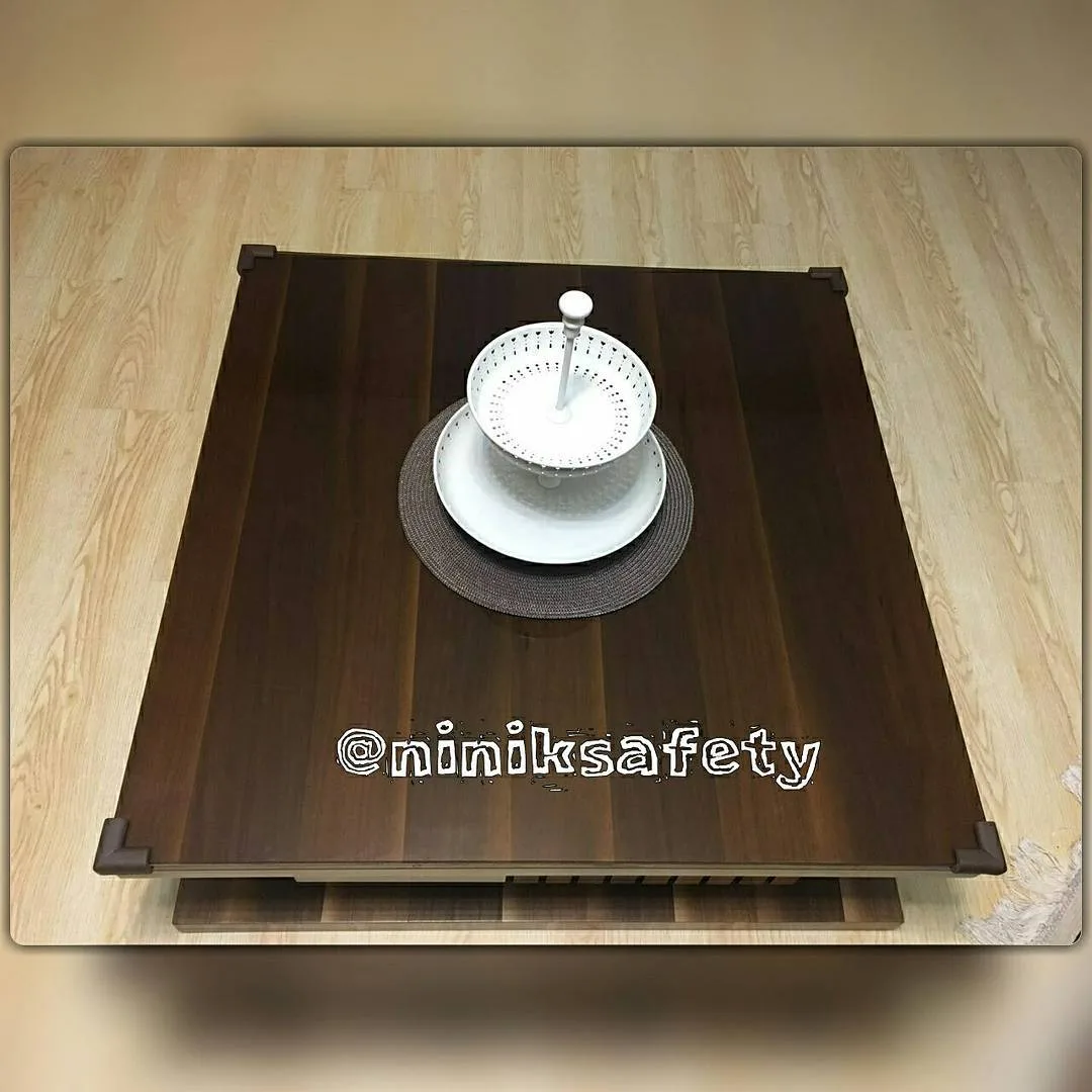محافظ گوشه میز نی نی ک، رنگ قهوه‌ای، جنس پلاستیک