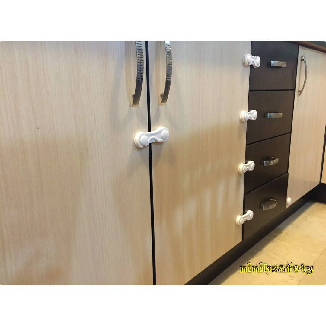 قفل کابینت نی نی ک، رنگ سفید، جنس پلاستیک، گیره‌ای