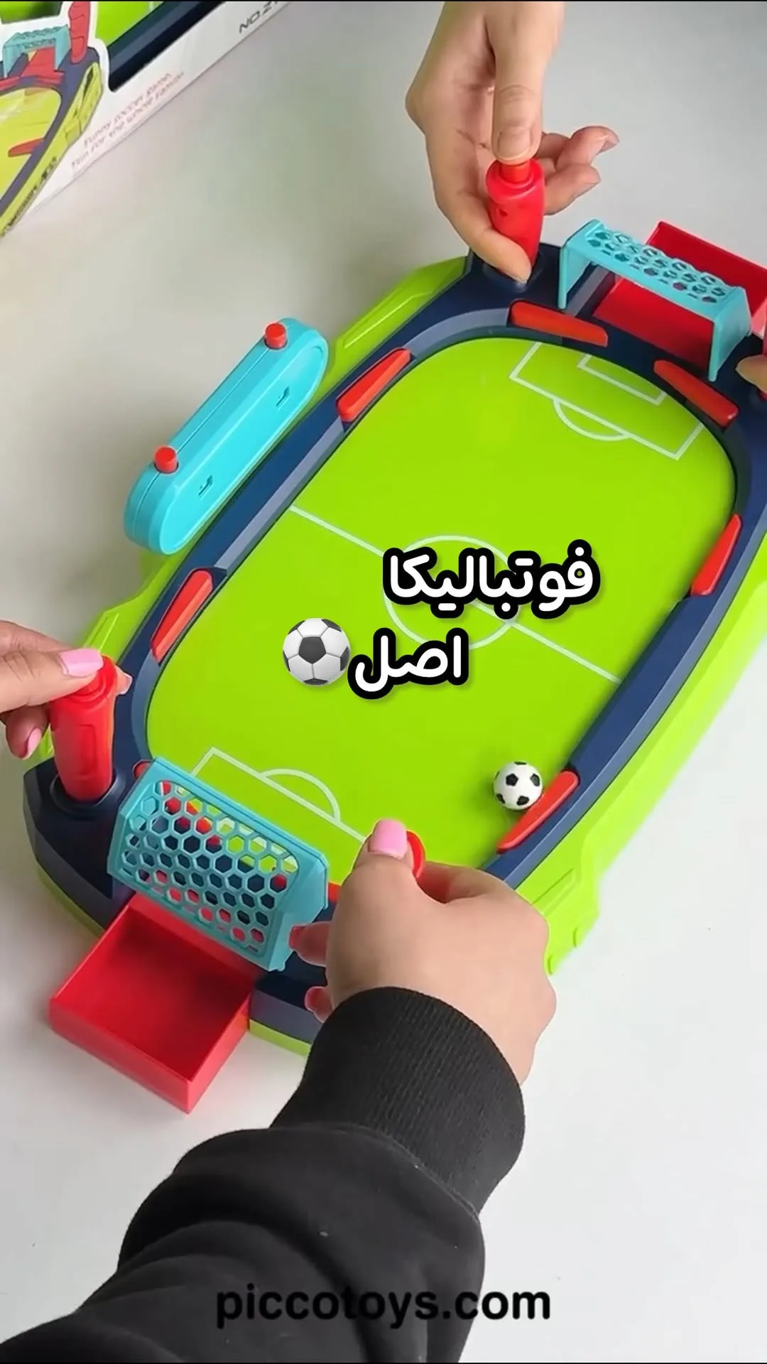 فوتبال دستی فوتبالیکا، رنگ سبز، سرمهای و قرمز، جنس پلاستیک، رومیزی کوچک