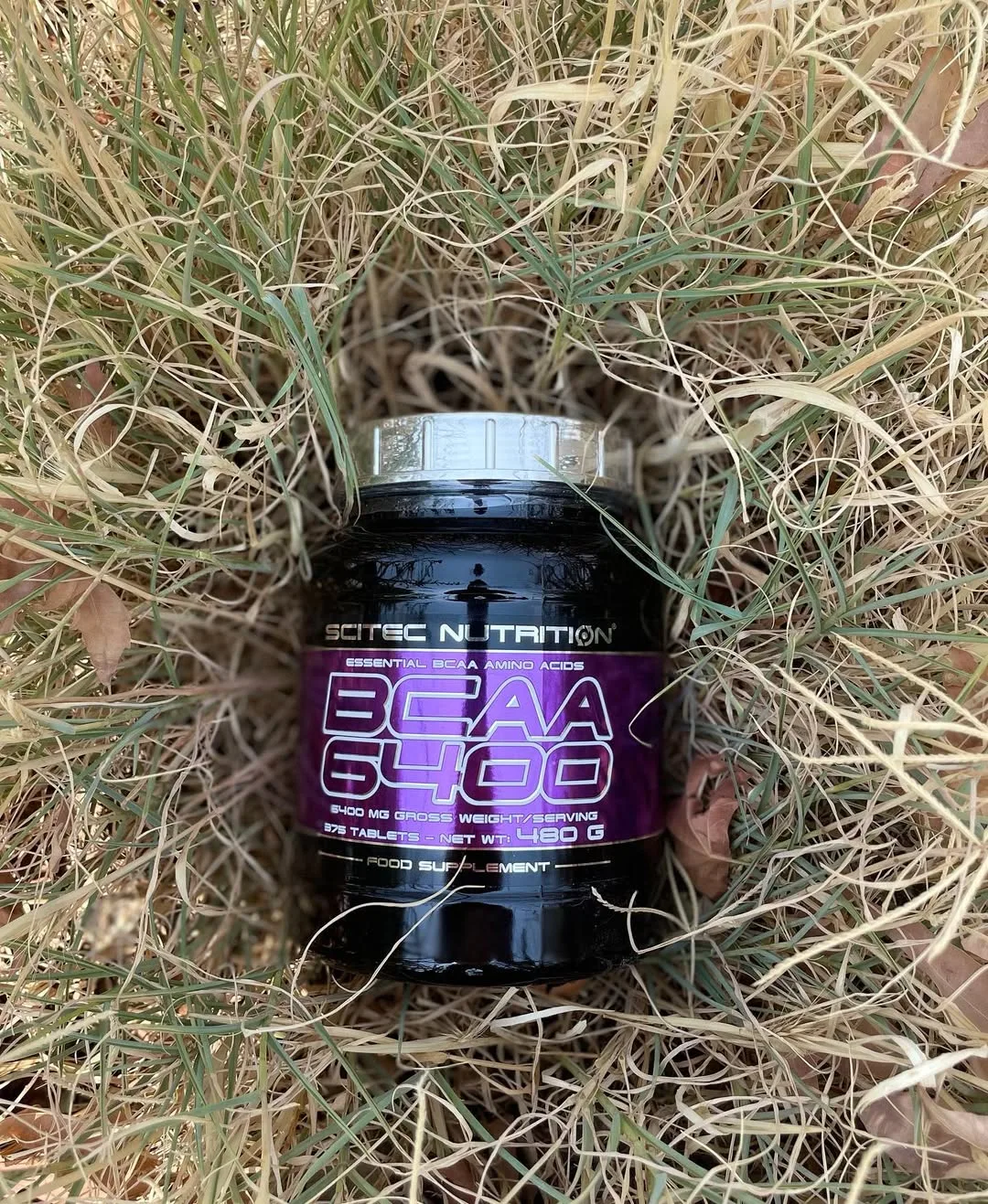 مکمل BCAA 6400 سایتک Scitec Nutrition، رنگ مشکی و بنفش، جنس پلاستیک، ظرف استوانه‌ای