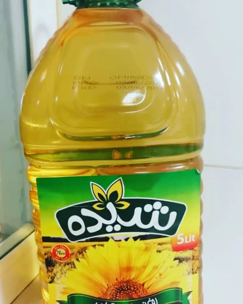 روغن مایع ۵ لیتری شیده، رنگ زرد، سبز و سفید، جنس پلاستیک، طرح گل‌دار، بطری پلاستیکی دسته‌دار