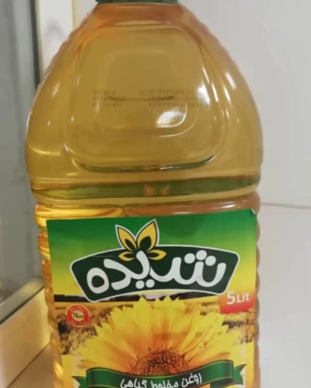 روغن مایع ۵ لیتری شیده، رنگ زرد و سبز، جنس پلاستیک، طرح گلدار، بطری ۵ لیتری