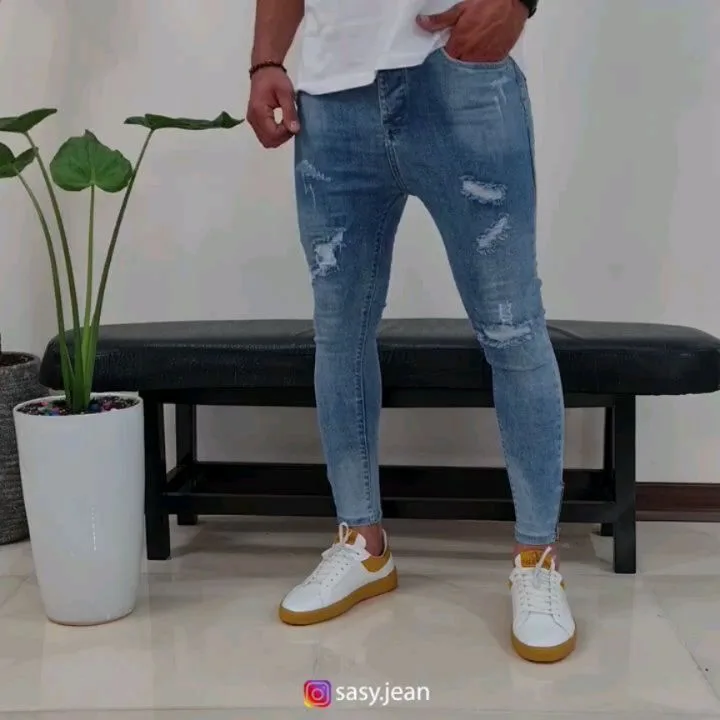شلوار جین کجراه دمپا زیپ، رنگ آبی، جذب، پاره