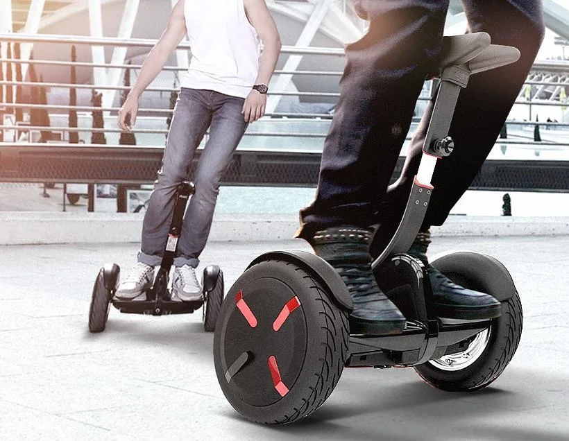 اسکوتر برقی ناینبات مینی پرو، رنگ مشکی و قرمز، جنس فلز و پلاستیک، دارای دسته و صندلی