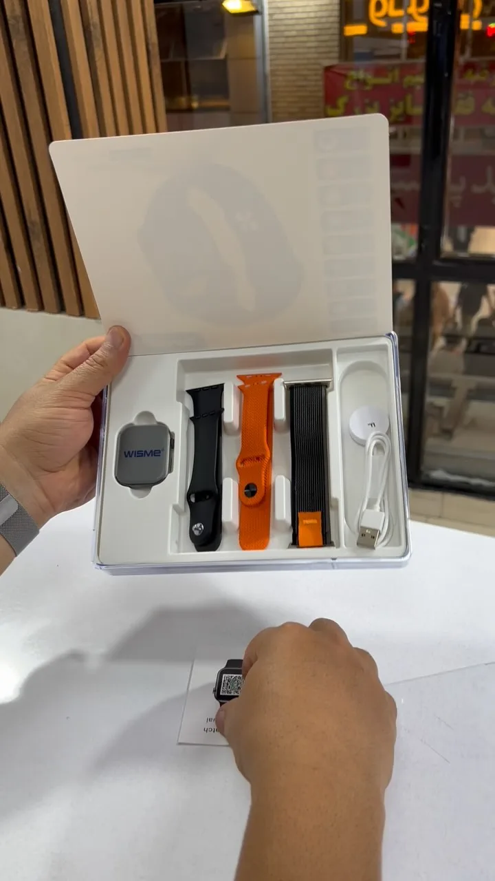 ساعت هوشمند مدل WSX12، رنگ خاکستری، مشکی و نارنجی، جنس سیلیکون و فلز، مستطیلی با بندهای اضافه
