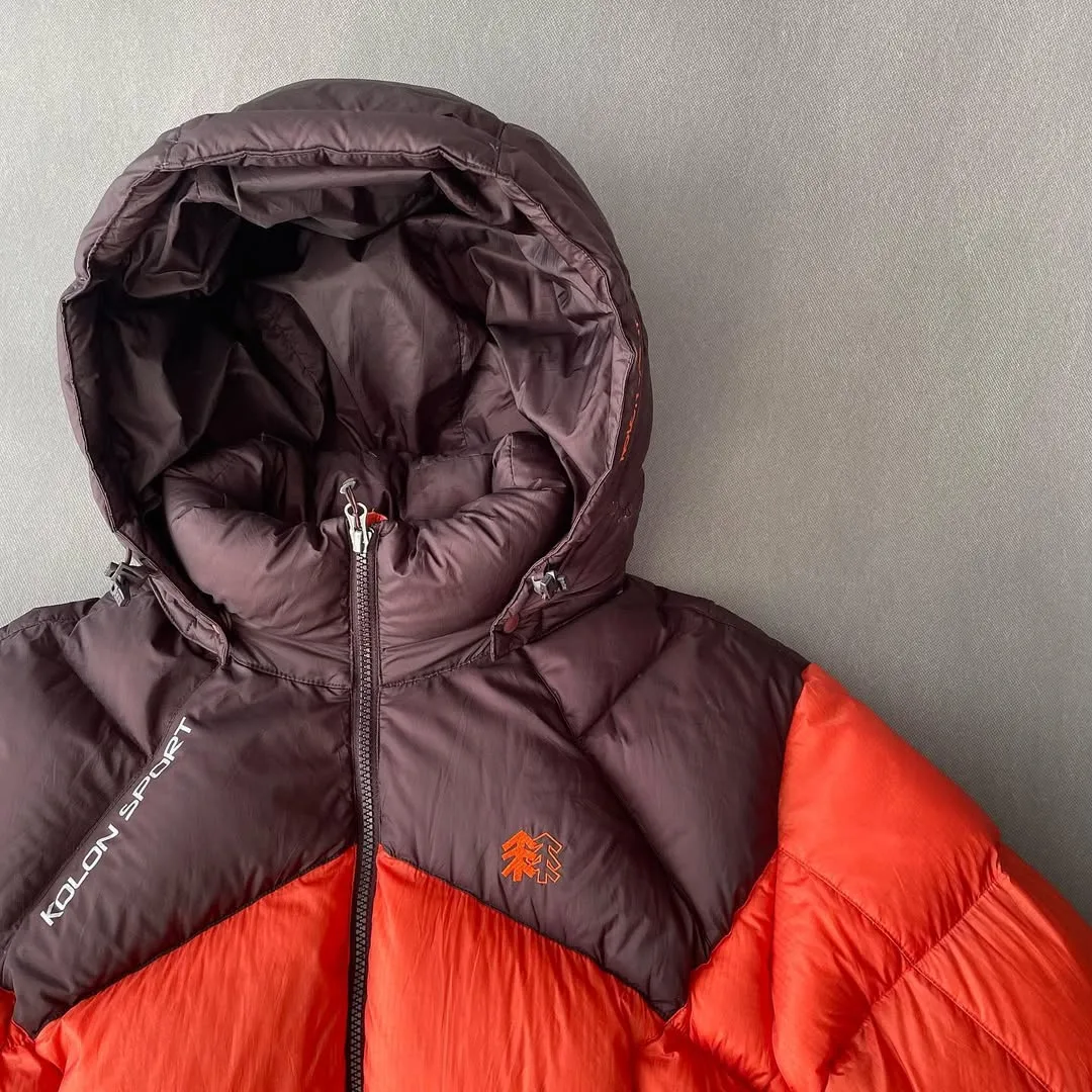 کاپشن پارچه پرتکس Kolon Sport، رنگ زرشکی و نارنجی، کلاهدار، آستین بلند، گشاد